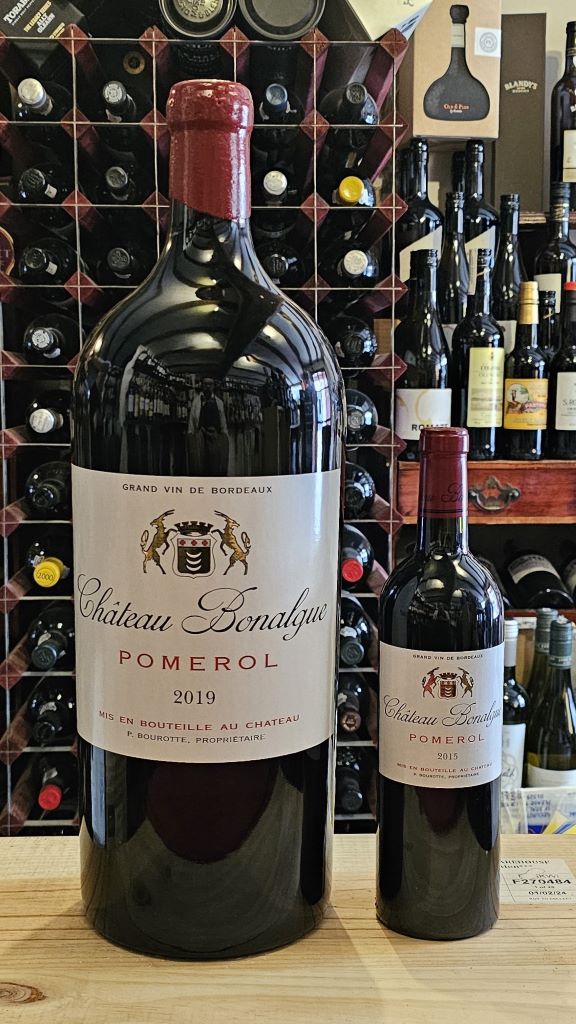 A 6 Litre Imperial of Chateau Bonalgue next to a standard 75cl bottle